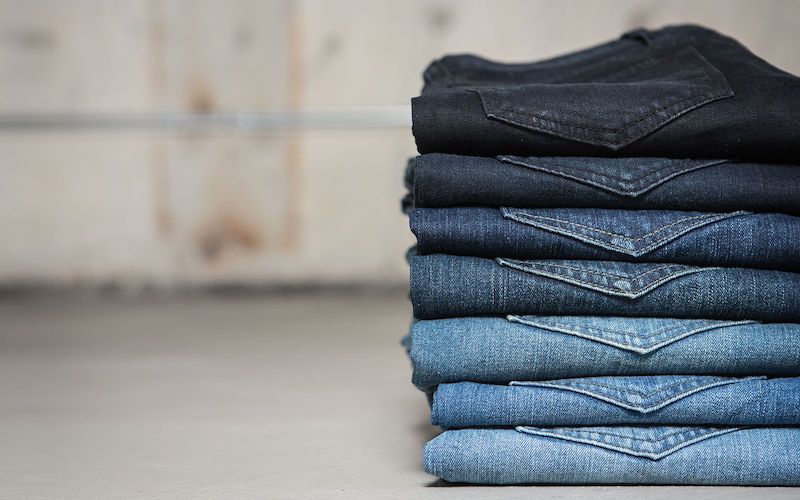 washed-jeans-stack-ba914286bd29f71f44a879705faefd3e